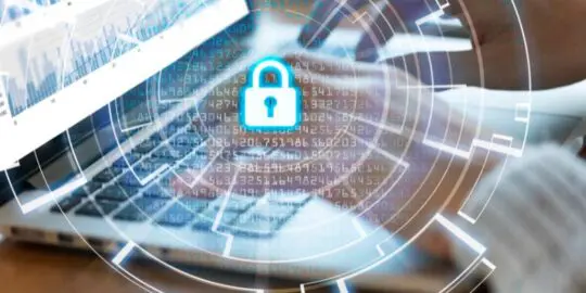 person typing on laptop with padlock overlay graphic - pen testing
