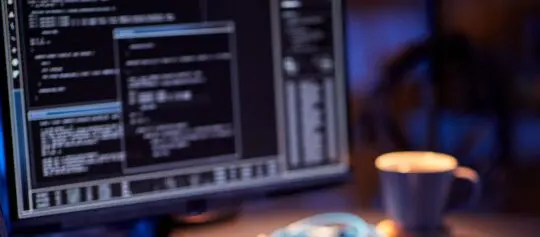 Computer screen in soft focus with code