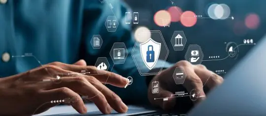 Top 10 Cyber Security Challenges for Businesses 7 Man using a laptop securely - cybersecurity