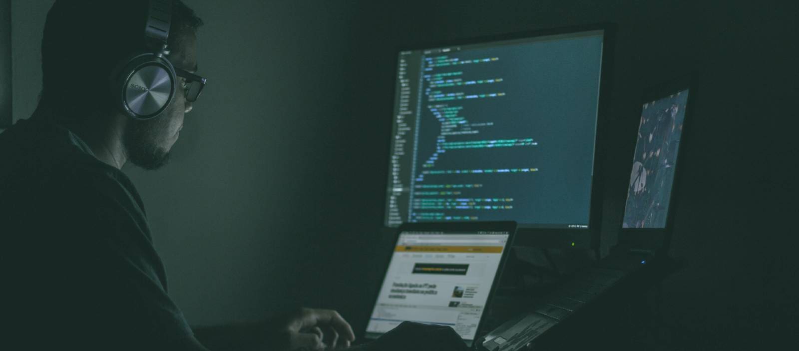 Cybersecurity expert reviewing computer code