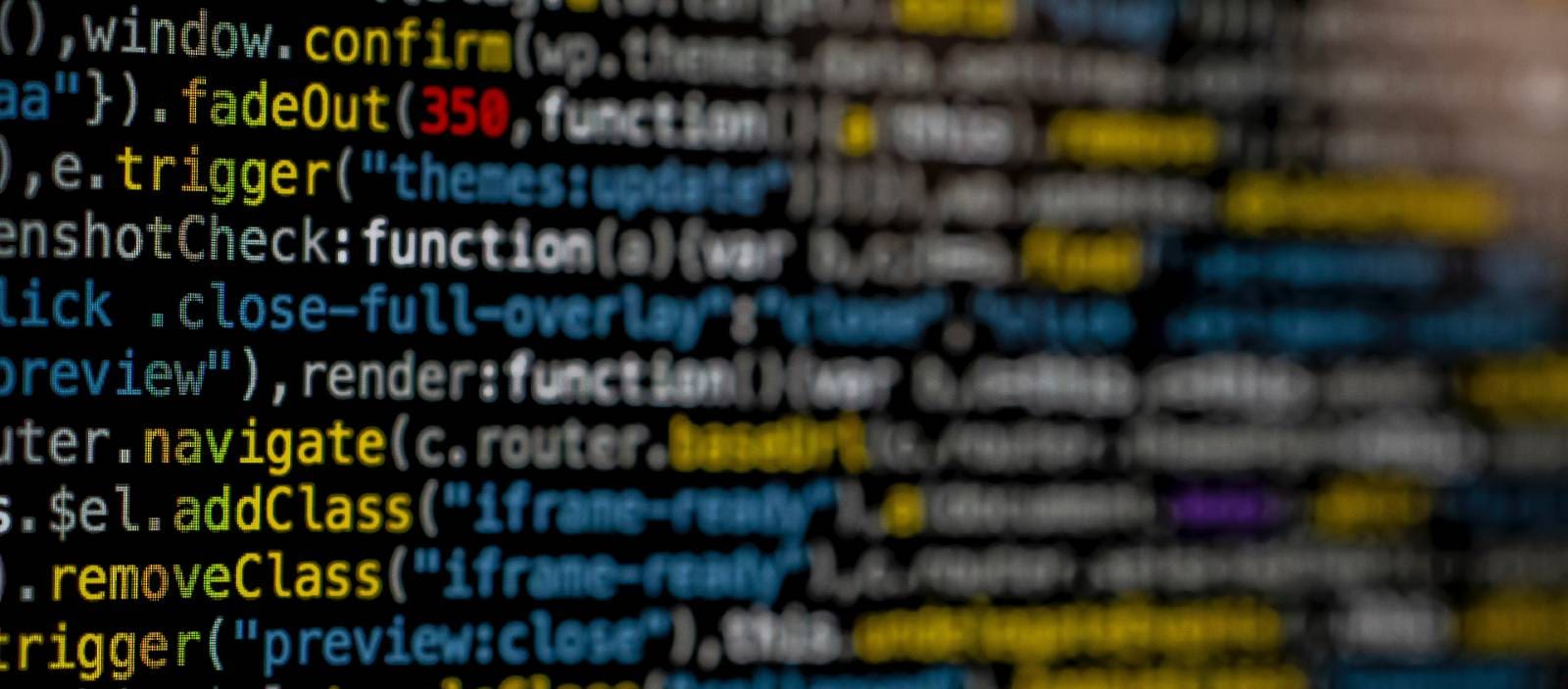 Cybersecurity expert reviewing computer code