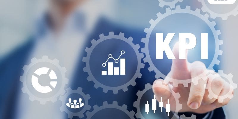 man pressing KPI graphic with finger