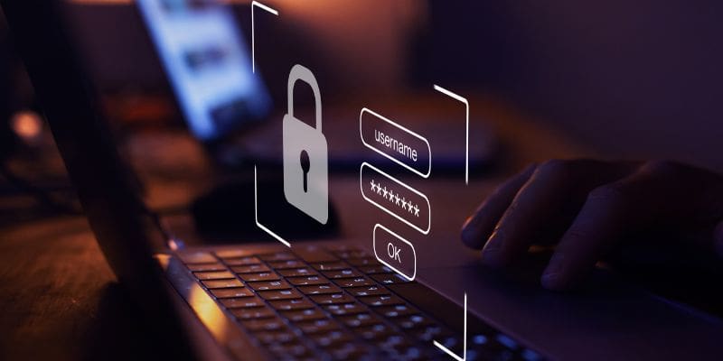 Laptop screen with padlock graphic overlay