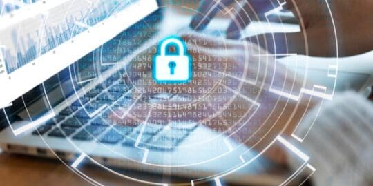 Mastering GDPR: The Crucial Role of Pen Testing in Data Protection Compliance 2 person typing on laptop with padlock overlay graphic - pen testing