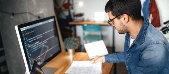 What is Cyber Risk Management? 3 IT person - cybersecurity risk